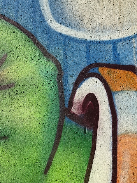 Fundo de graffiti arte de rua abstrata colorida e brilhante desenhando linhas na parede