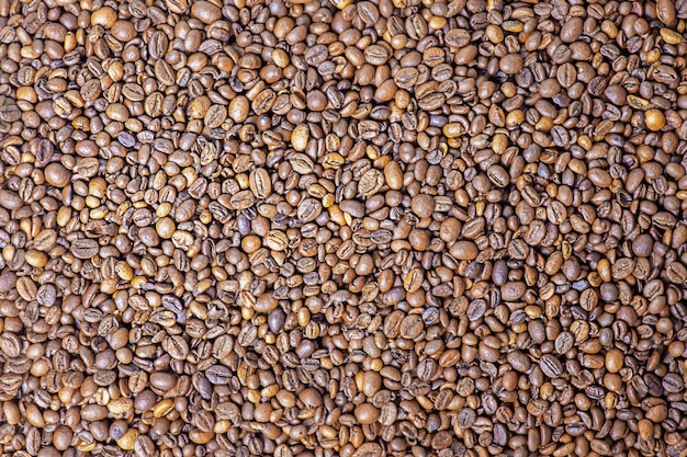 fundo de grãos de café torrados grãos de café inteiros macro
