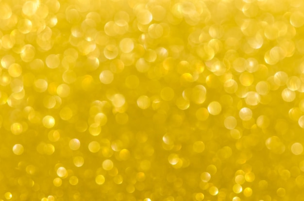 Fundo de luzes de ouro glitter abstrato. desfocado. Natal