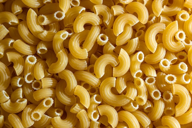 Foto fundo de macarrão chifferi rigati cru