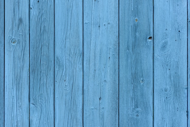 Fundo de madeira azul, efeito da idade, placas antigas pintadas de azul claro