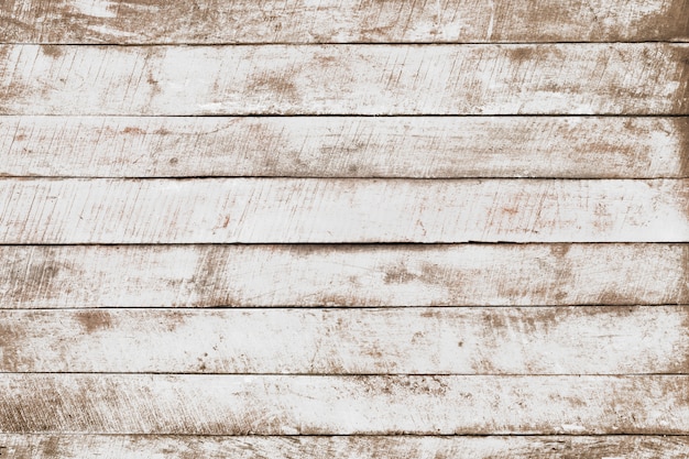 Fundo de madeira branco do vintage - prancha de madeira resistida velha pintada na cor branca.