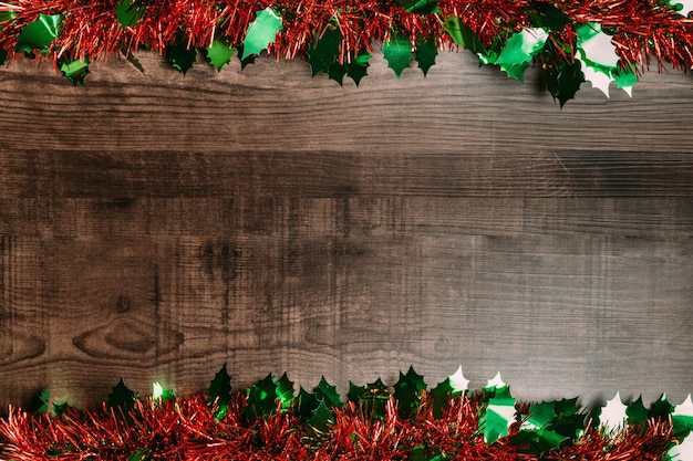 Fundo de natal com enfeite de mesa de madeira. flat leigos para banner de natal.