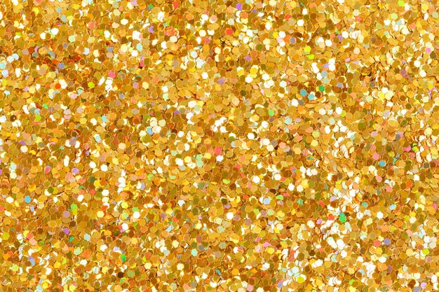 Fundo de natal com textura de purpurina laranja Glitter dourado brilhante