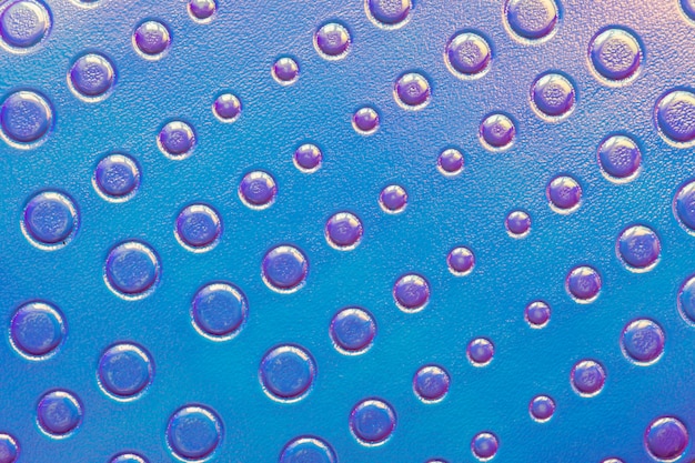 Foto fundo de padrões holográficos circulares, azul e rosa