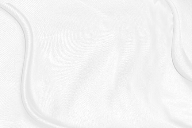 Foto fundo de pano texturizado de seda branca close up de tecido de cetim ondulado com ondas suaves