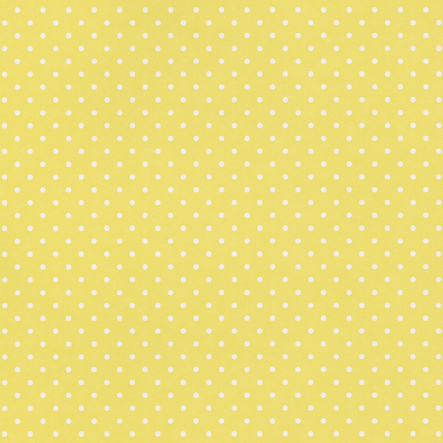 Fundo de papel amarelo com padrão branco