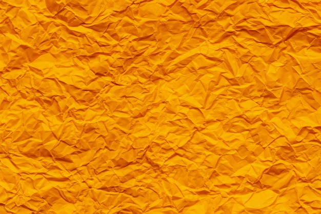 Foto fundo de papel amassado laranja