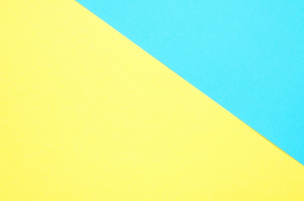 Fundo de papel geométrica. Fundo da textura do papel da cor do amarelo e da turquesa.