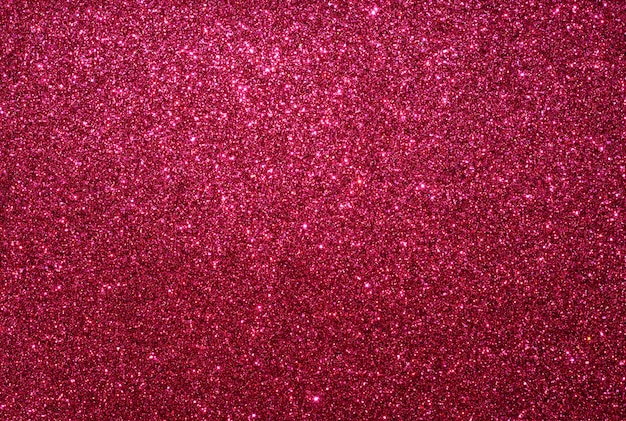 Foto fundo de papel glitter vermelho. textura abstrata festiva