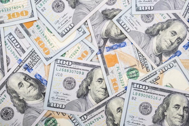 Fundo de papel-moeda de notas de cem dólares dos EUA