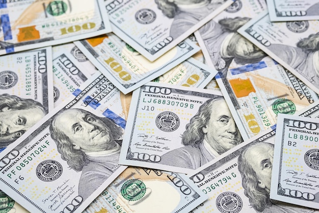 Fundo de papel-moeda de notas de cem dólares dos EUA