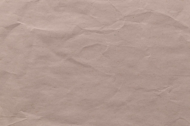 Fundo de papelão de textura de folha de papel kraft reciclado de cor marrom