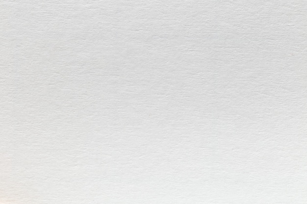 Foto fundo de papelão de textura de folha de papel kraft reciclado eco branco.