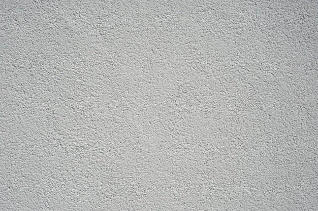 Fundo de parede de estuque branco textura de parede de cimento pintada de branco