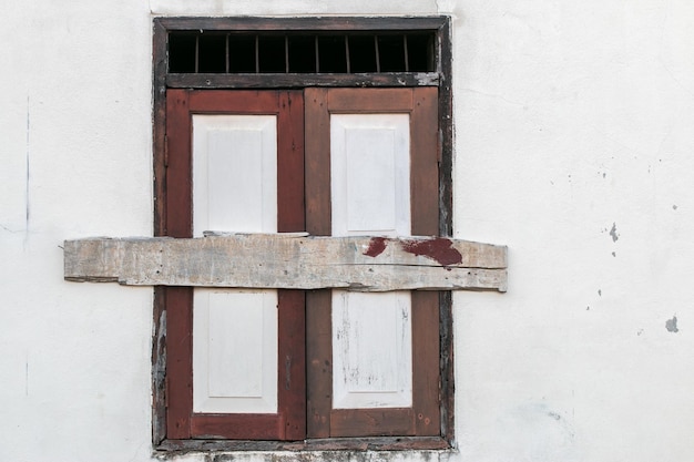 Foto fundo de parede de tijolos antigos de concreto rachado