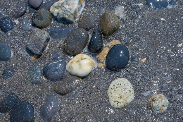 Fundo de pequenas pedras na praia