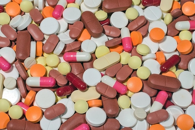 Fundo de pílulas médicas multicoloridas