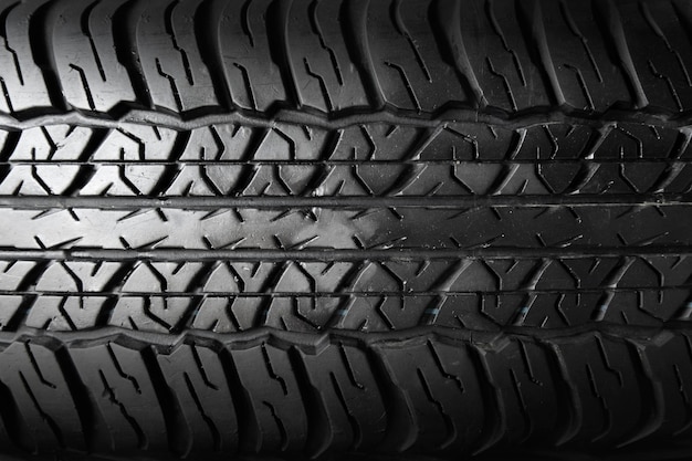 Foto fundo de pneus de automóveis fundo de textura de pneus em close-up