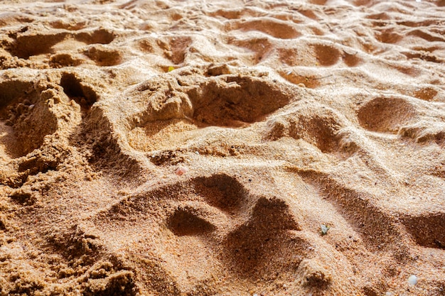 Foto fundo de praia de areia texturizada