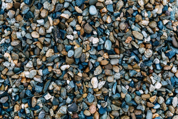 Fundo de seixos do mar mosaico Textura de pequenos seixos multicoloridos marinhos