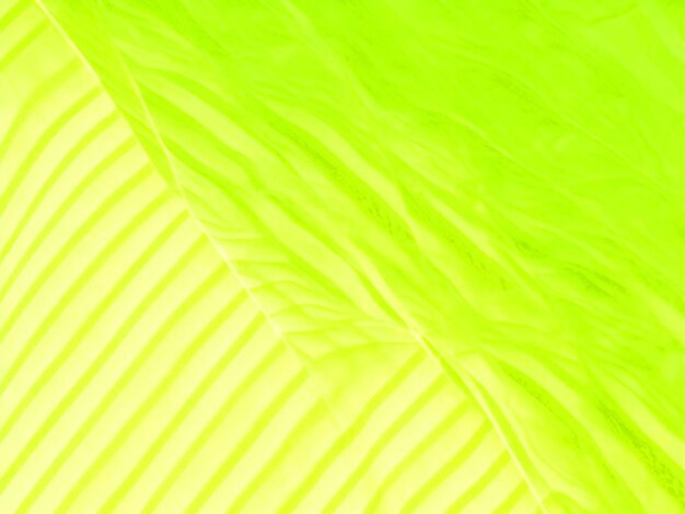 Foto fundo de tecido abstrato verde limão amarelo gradiente de cor ombre linhas geométricas listras onda