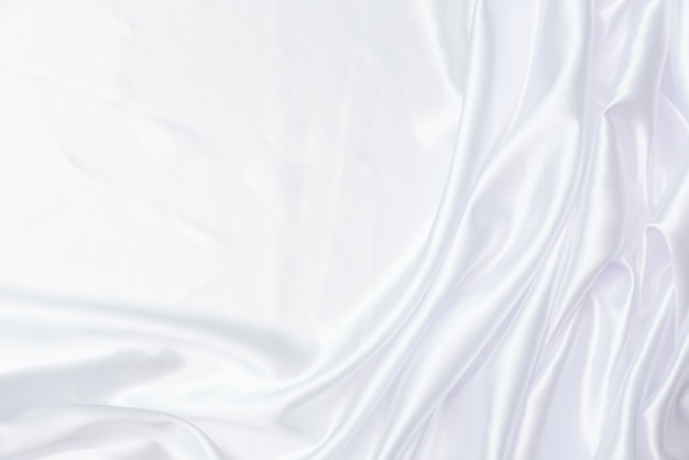 Foto fundo de tecido branco e textura, padrão e detalhe sulcado de tecido branco para est