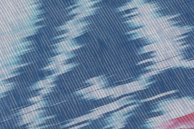 Foto fundo de tecido de seda com ornamentos orientais. seda uzbeque com enfeite