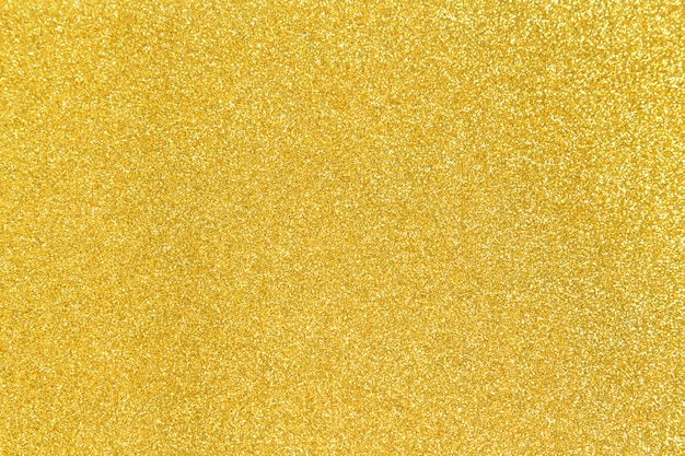 Fundo de textura brilhante de glitter dourado para o Natal