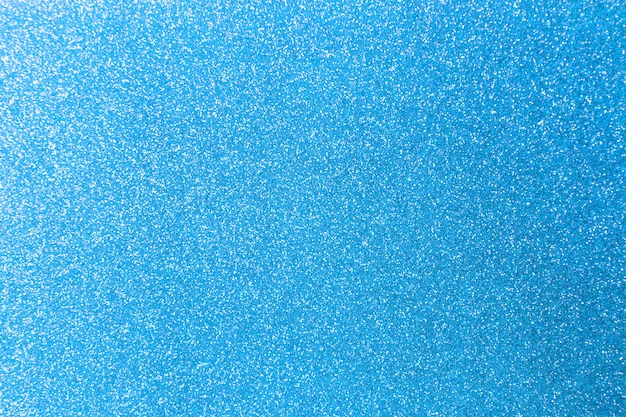 Foto fundo de textura brilhante glitter azul