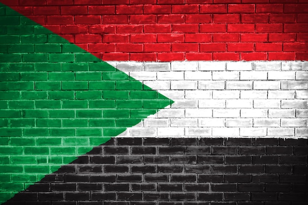 Fundo de textura da parede da bandeira do Sudão