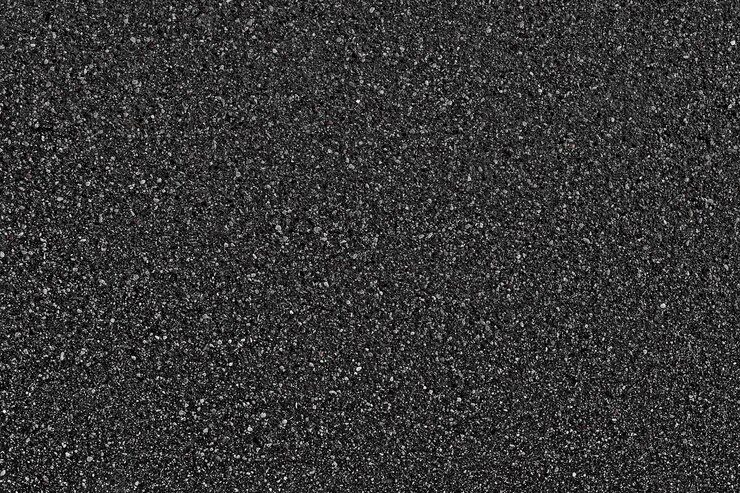 Foto fundo de textura de asfalto preto. vista do topo.