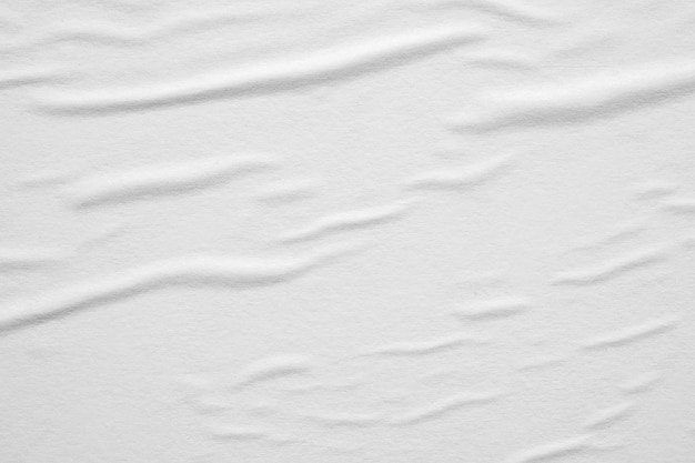 Fundo de textura de cartaz de papel amassado e amassado branco em branco