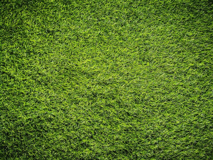 Fundo de textura de grama verde artificial.