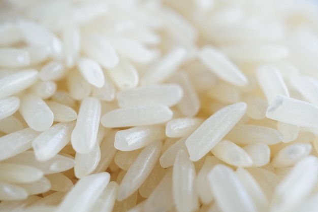 Foto fundo de textura de grãos de arroz jasmim da tailândia fecha