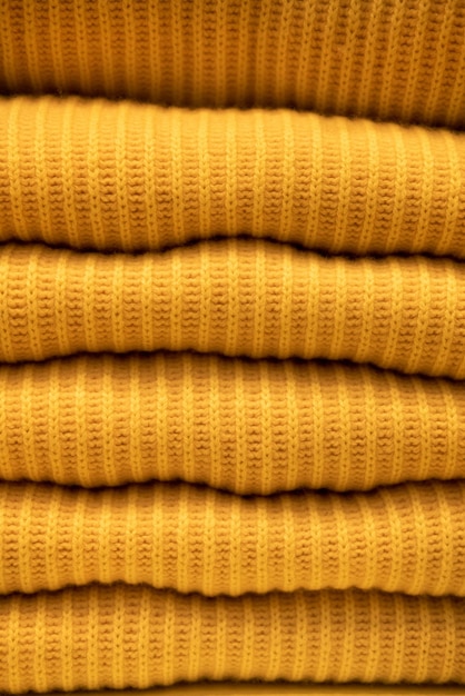 Fundo de textura de lã de tricô amarelo feito à mão