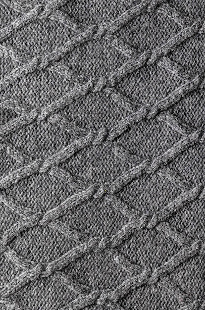 Fundo de textura de lã de tricô cinza feito à mão