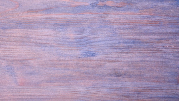 Fundo de textura de madeira antiga em placa de madeira de cor violeta roxa, cor do espaço de cópia