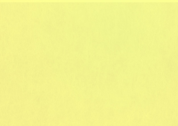 Fundo de textura de papel amarelo pálido. limpo em branco