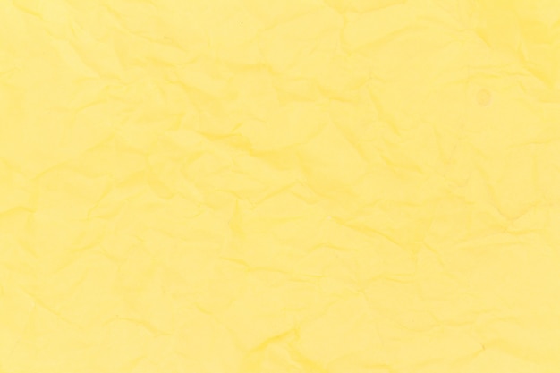 Foto fundo de textura de papel amassado amarelo