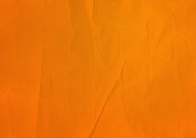 Foto fundo de textura de papel amassado laranja