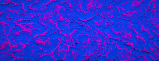 Foto fundo de textura de papel amassado pintado de azul e vermelho