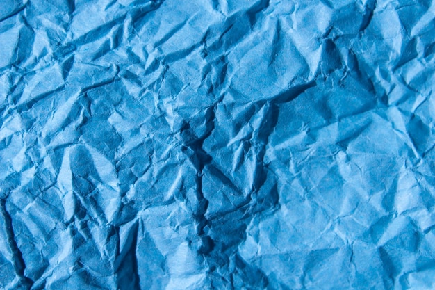 Fundo de textura de papel azul amassado