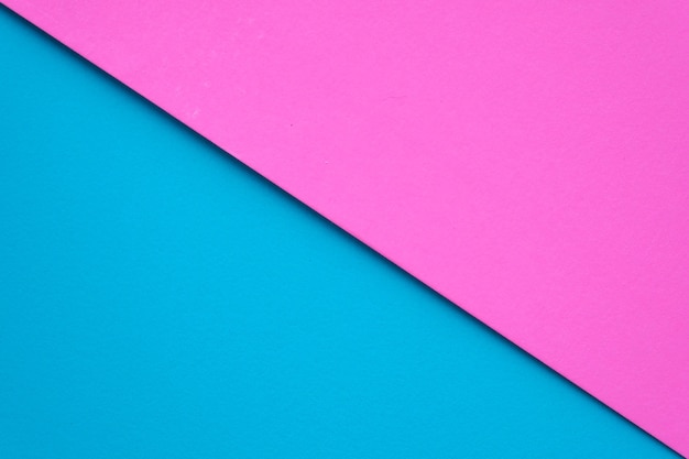 Fundo de textura de papel azul e rosa em branco