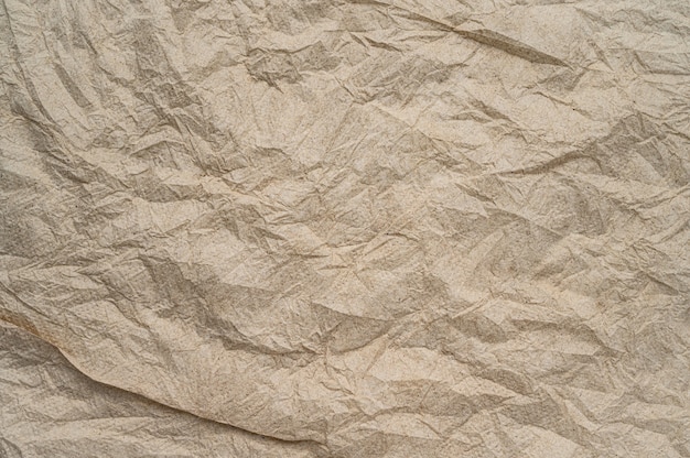 Fundo de textura de papel marrom com rugas abstratas