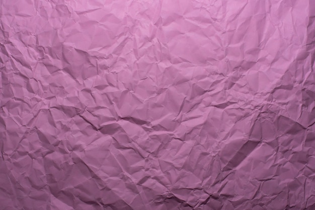 Fundo de textura de papel roxo amassado