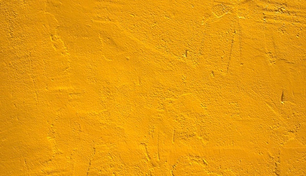 Fundo de textura de parede de gesso dourado