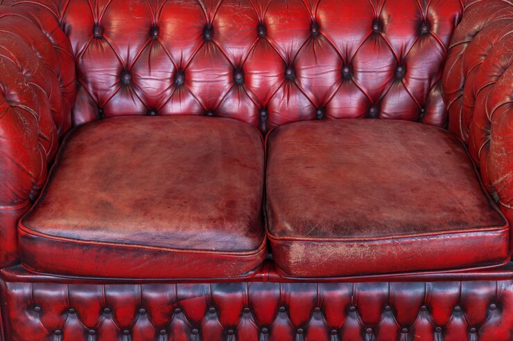 Foto fundo de textura de sofá de couro genuíno vintage vermelho