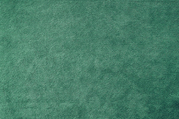 Fundo de textura de tecido de estofamento de veludo verde