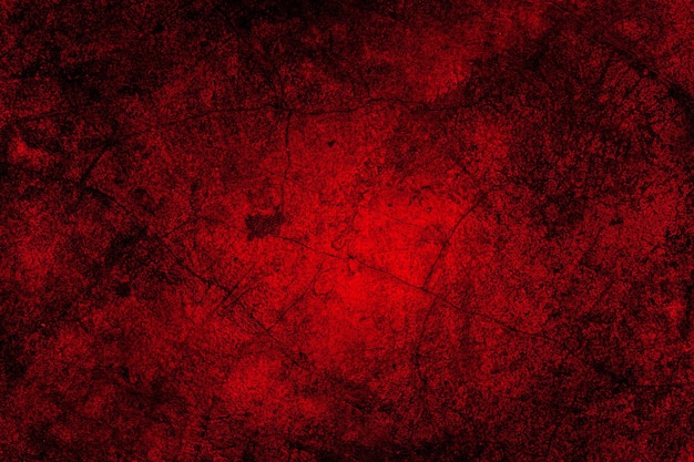 Fundo de textura grunge vermelho de parede de gesso de cimento com rachaduras